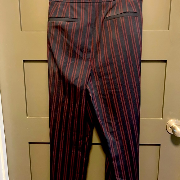 “Julie” navy trousers with red pin stripes and pocket button accents. - Picture 3 of 5
